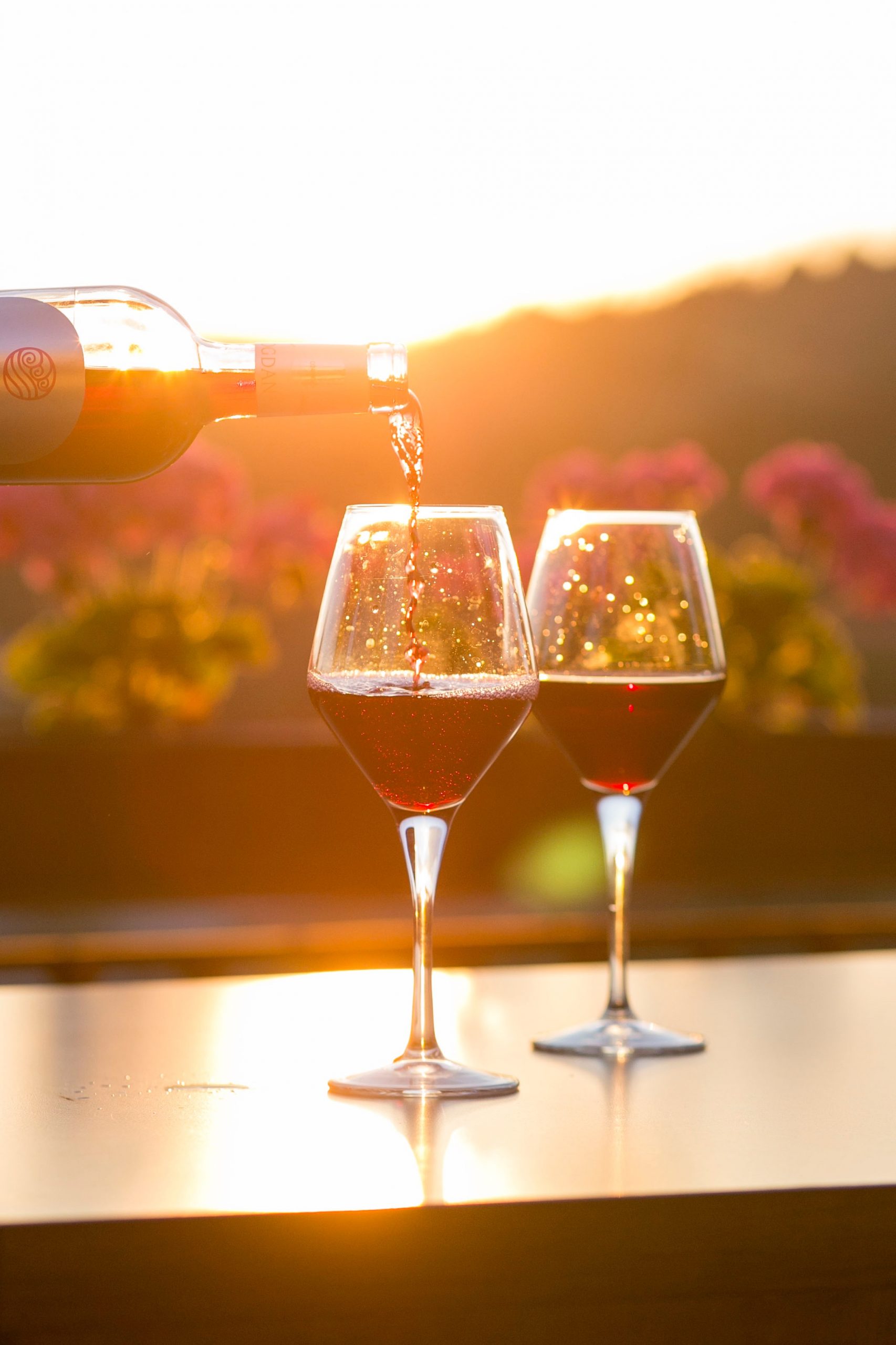 Wine glasses at sunset